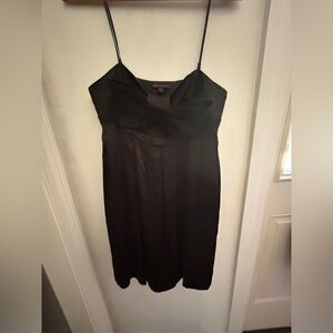 Silk Betsey Johnson size 8 100% silk dress. Black. Adjustable straps. Bow.